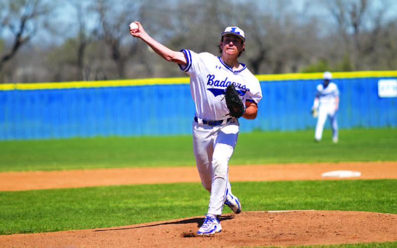 Calvin Phelps conceded only four hits against Taylor in the district opener. HUNTER KING | DISPATCH RECORD