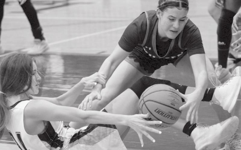 LHS senior Addison McDonald fights for a loose ball in Tuesday’s 49-46 victory over Killeen High School. JEFF LOWE | DISPATCH RECORD
