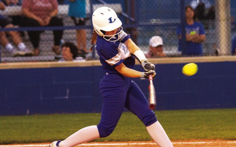HUNTER KING | DISPATCH RECORD Jenni Posten hits a line drive during game two of the playoff series.
