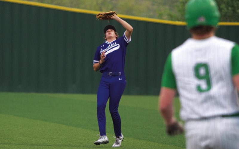 HUNTER KING | DISPATCH RECORD Owen Stubbs catches a pop-up just outside of the infield.