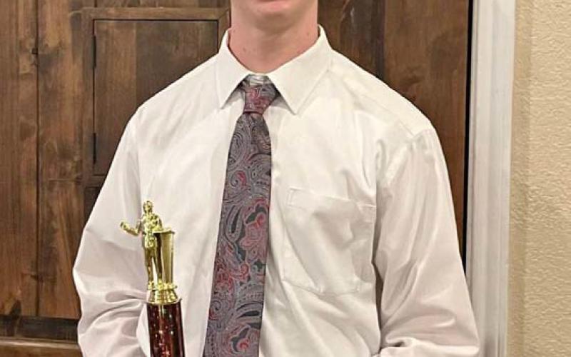 Cale Wheeler earned a first-place trophy in Lincoln-Douglas debate at the recent competition. Courtesy photo