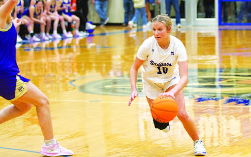 HUNTER KING | DISPATCH RECORD Tenley Langford dribbles past a defender in the fourth quarter of last Friday’s game.