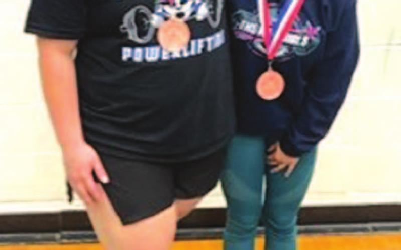 Lila Walling, left, and Nimsi Vergara, pose for a photo after both of them qualified for the state meet. COURTESY PHOTO