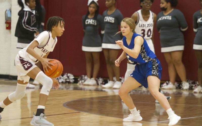 Hadley Oncken guards the Lady Roo ball handler in the second half of Tuesday’s game. HUNTER KING | DISPATCH RECORD