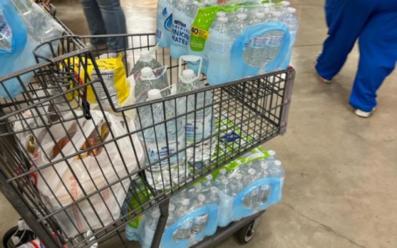 Residents headed to stores Thursday morning to stock up on water in case service was suspended. At HEB, store associates cautioned customers not to panic buy. HEB also said it has trucks on standby to bring more water to the community if needed. JOYCESARAH MCCABE | DISPATCH RECORD