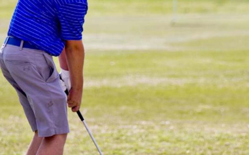 Peyton Spore putts on the final hole at Gatesville Country Club. JEFF LOWE | DISPATCH RECORD