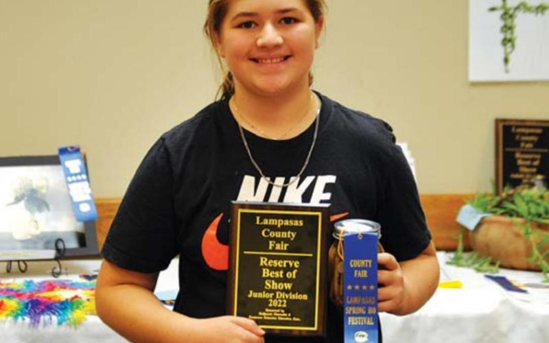Kambry Tower won co-reserve best of show in the junior division for her red chili dill pickles. MASON HINES | DISPATCH RECORD