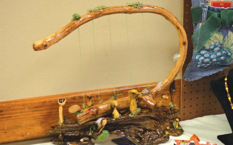 Entrants in the craft division made various items, such as purses, or the wood carving seen here. MASON HINES | DISPATCH RECORD
