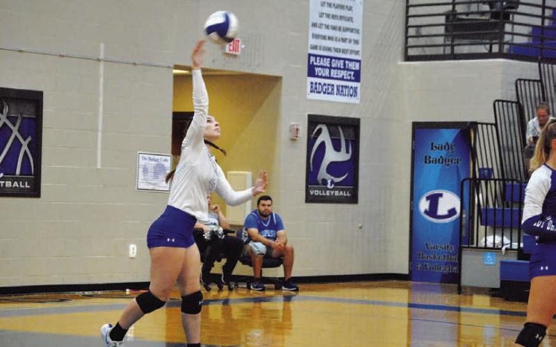 Emily Cain hits a serve during the first set against Shoemaker. The senior and the Lady Badgers will be back in action tonight. HUNTER KING | DISPATCH RECORD