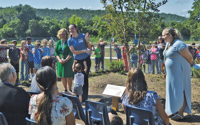 Taylor Creek Elementary students Devlin Eveleth, 10, and his 8-year-old brother Shaemus were memorialized during a remembrance ceremony at the campus Monday morning. erick mitchell | dispatch record