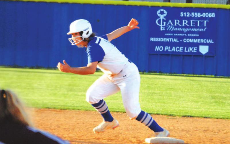 Alycia Cantu takes off from second base after her double in the second inning that got the Lady Badger offense going. HUNTER KING | DISPATCH RECORD