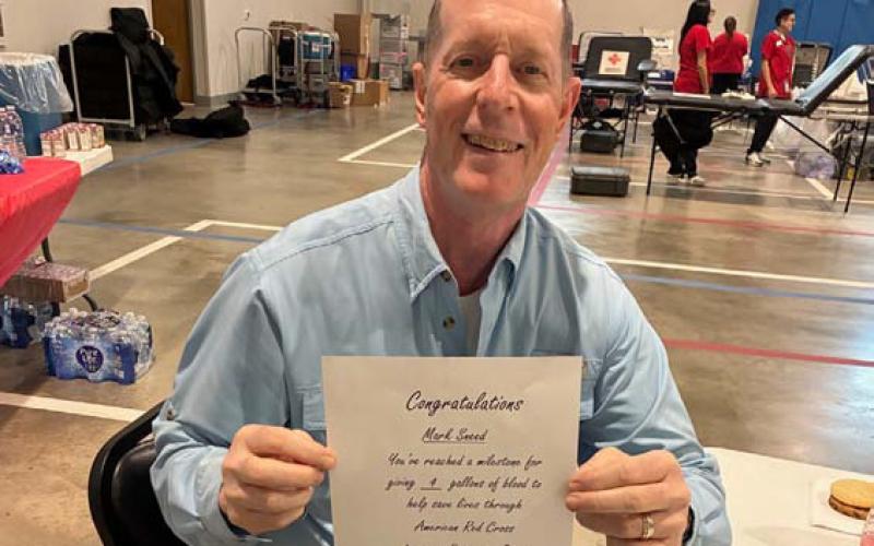 Mark Sneed has donated a total of four gallons of blood. court esy photo