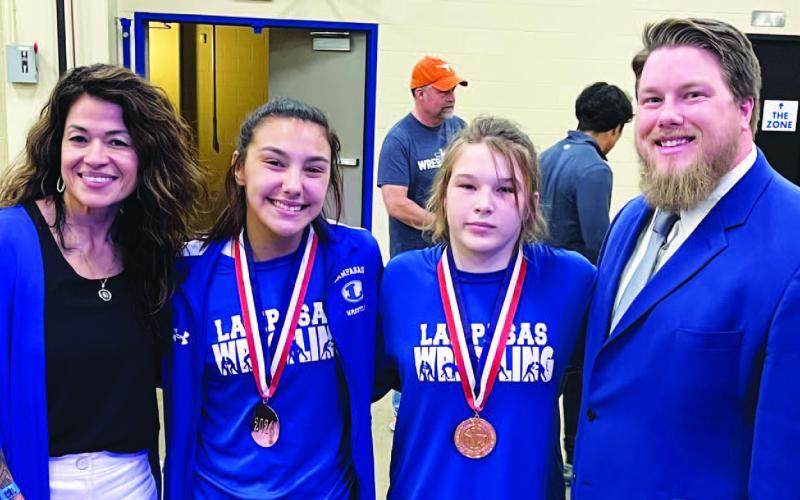 COURTESY PHOTO | LAMPASAS WRESTLING Elma Garnett, left, Freese, Martell and Donovan Kleckner are all smiles after the state competition.