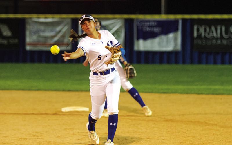 Emory Vineyard throws over to first base to record an out against Salado. HUNTER KING | DISPATCH RECORD