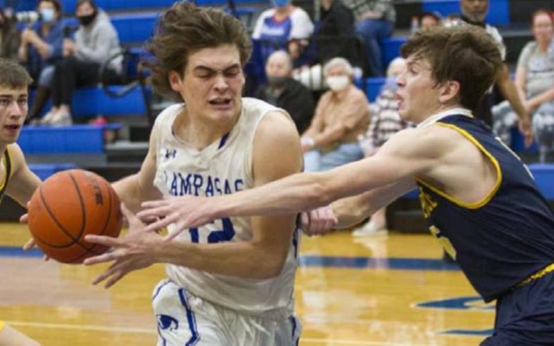 Landon Mulcahy drives to the basket in an earlier district game before the Badgers’ loss at Glen Rose. JEFF LOWE | DISPATCH RECORD