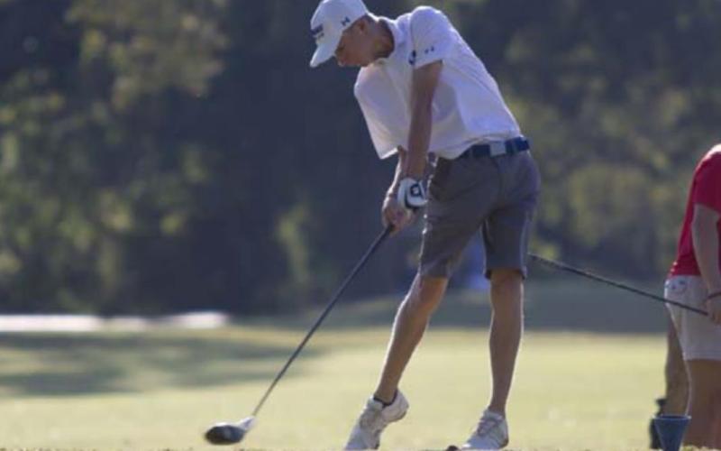 Coulson Plouff tees off on hole 4 during the tournament in Lampasas on Friday. HUNTER KING | DISPATCH RECORD