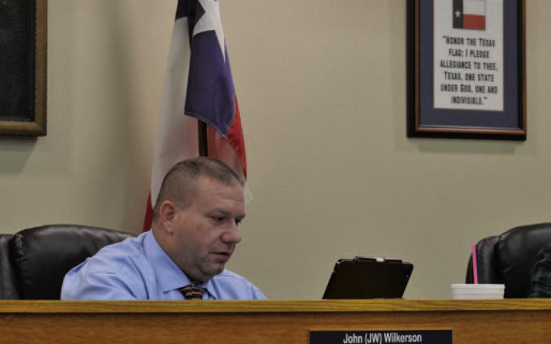 Mayor John Wilkerson looks over statistics regarding the special sales tax during Tuesday’s Kempner City Council meeting. ERICK MITCHELL | DISPATCH RECORD
