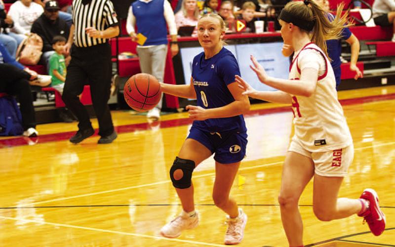 HUNTER KING | DISPATCH RECORD Tenley Langford eyes the basket as she drives in for a layup against Salado.