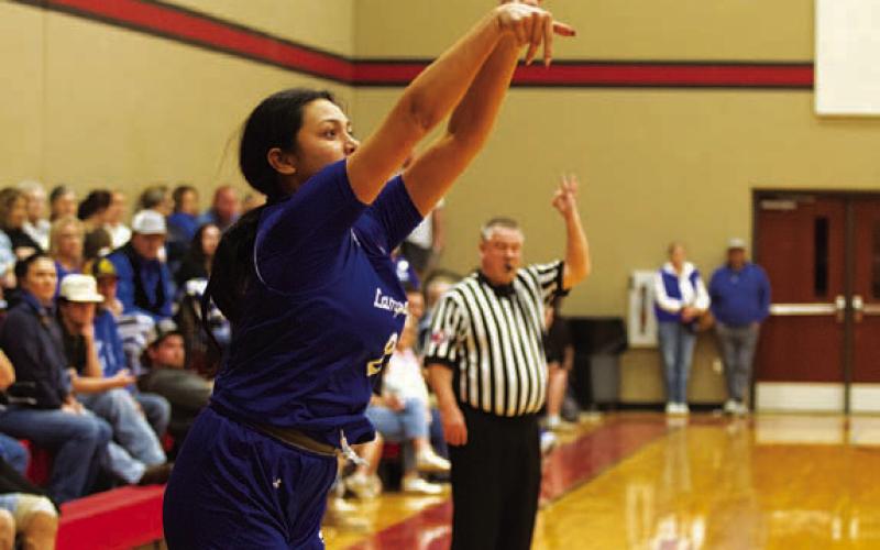Johnnie Lewis releases a shot against the Lady Eagles. HUNTER KING | DISPATCH RECORD