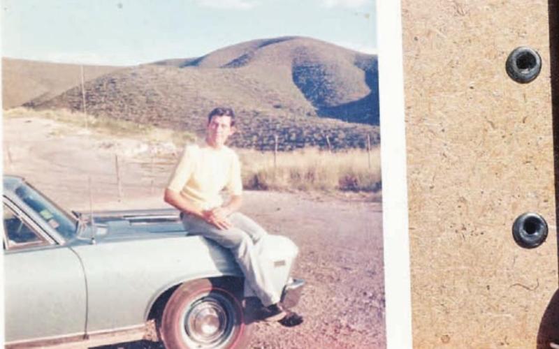 Elzie Jones shows a photo of his car a week after he bought it in the late 1960s. COURTESY PHOTO