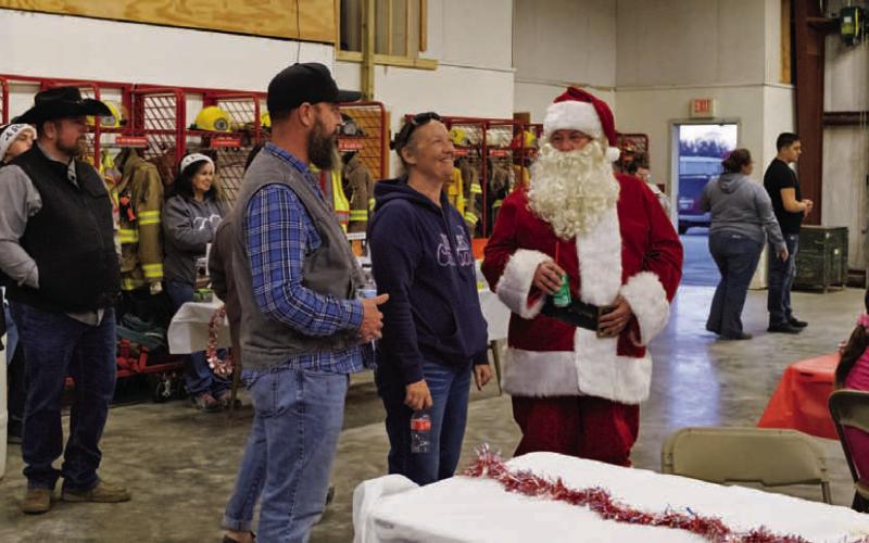 The annual Lometa Hometown Christmas celebration was held in the Lometa Volunteer Fire Department fire station, and was attended by community members as well as special guests from the North Pole. ADAM BARRIOS | DISPATCH RECORD