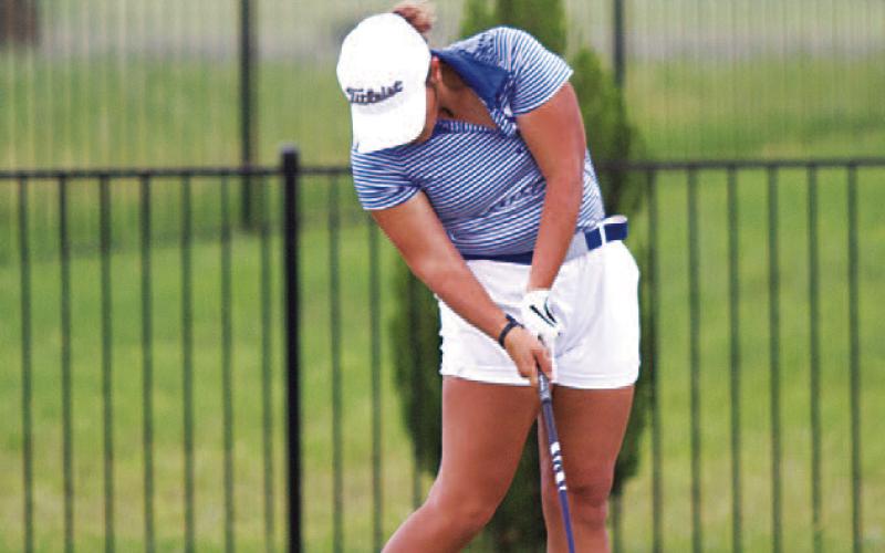 Arianna Gonzalez swings through a shot. HUNTER KING | DISPATCH RECORD