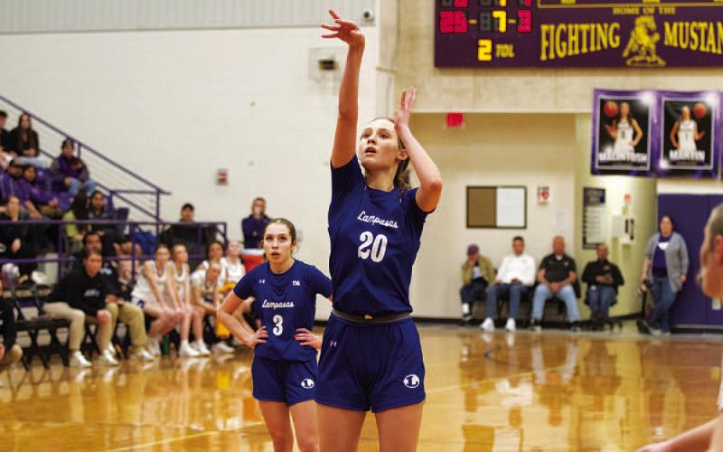 Lainey Dixon shoots a free throw for one of her 14 points against the Lady Mustangs. HUNTER KING | DISPATCH RECORD