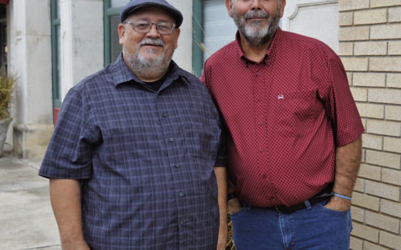 ERICK MITCHELL | DISPATCH RECORD Brothers Terry Bowden, at left, and Eddie Bowden reminisced with the Dispatch Record about their late father’s famous biplane.