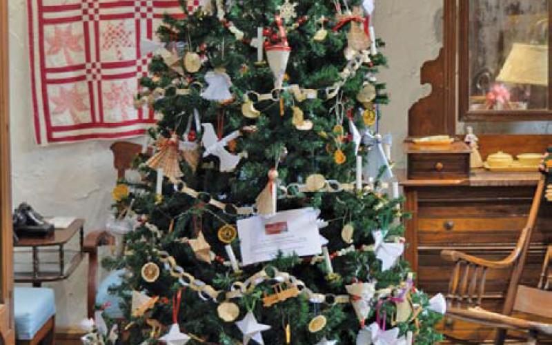 The museum was filled with the Christmas spirit during last weekend’s Carol of Lights celebration, as entries were displayed for the annual Tree Decorating Contest. erick mitchell | dispatch record