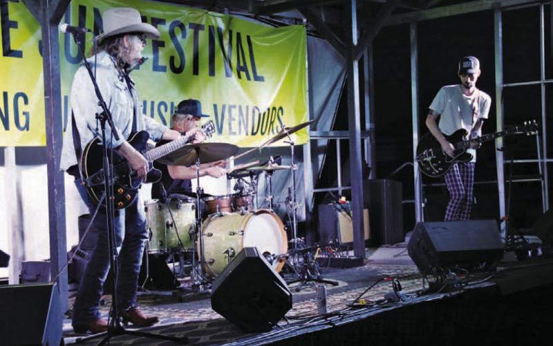 CHERI JAY-WIENECKE | DISPATCH RECORD Ray Wylie Hubbard, left, performs at the Sun Festival at Lometa Regional Park on Sunday. He is accompained by drummer Cal Schneider and guitarist Lucas Hubbard, pictured left to right. The festival featured live music and camping for the Monday eclipse.