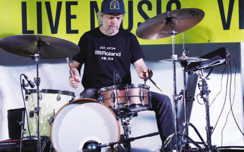 Drummer Cal Schneider gets into a groove at the Sun Festival on Sunday. The festival featured a number of notable performers including Ray Wylie Hubbard, Two Tons of Steel and local band, the Lampasas All Stars. CHERI JAY-WIENECKE | DISPATCH RECORD