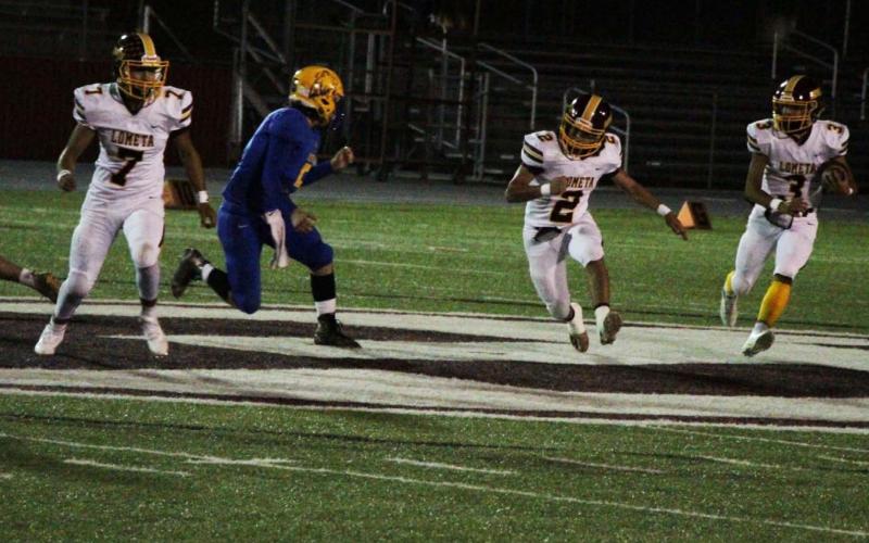 Alonso Caso (3) looks for room to run, while Tim Juarez (2) blocks against Medina. JESSICA MALDONADO | DISPATCH RECORD
