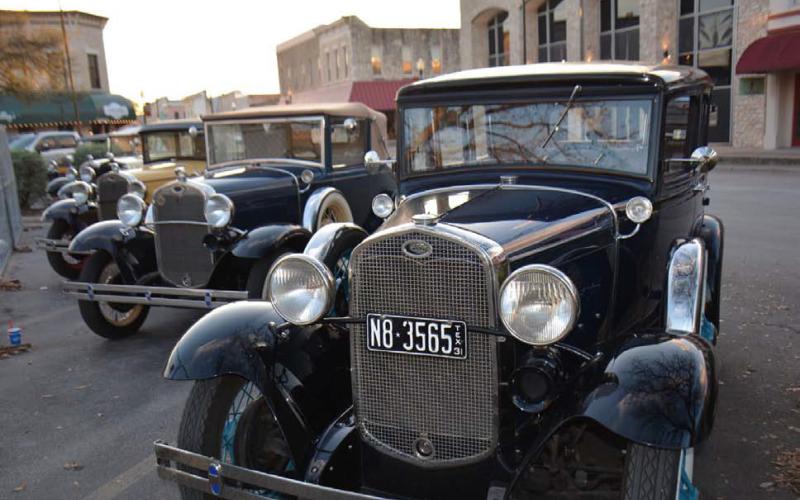 Although the look can be deceiving, this photo capuring vintage automobiles along the Lampasas downtown square was taken in March and published in the April 1, 2025 edition. The image provides a glimpse of what downtown square may have looked like years ago. FILE PHOTO