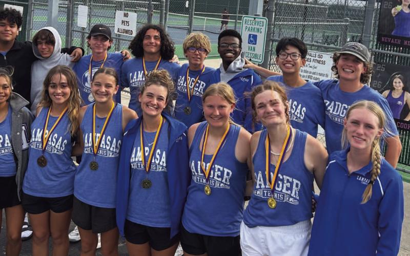 The Lampasas tennis team poses for a photo following their tournament in Marble Falls. COURTESY PHOTO | KENNETH PEISER