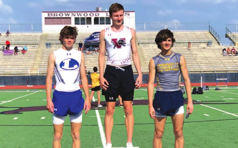 Nate Borchardt, left, stands on the podium in second place after his 400-meter dash performance last Friday. COURTESY PHOTO