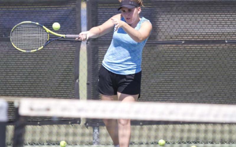 Kailr Clements hits a forehand shot during a tennis practice last week at Lampasas High School. HUNTER KING | DISPATCH RECORD
