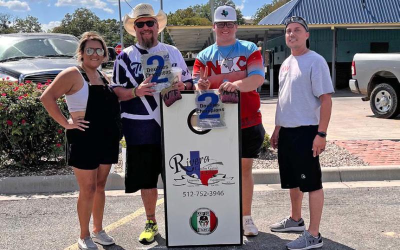 Second place was claimed by Tex Kirkpatrick and Bubba Kirkpatrick. They are pictured here with event organizers Val Sanchez, left, and Kenny Murray, right. courtesy photo
