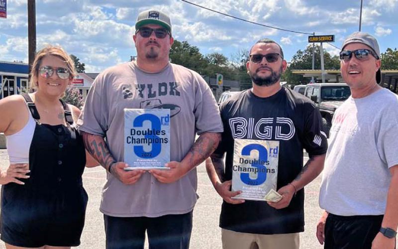 Toby Davis and Jesse Gonzales took third place in the Murray Events Cornhole Tournament. They are pictured here with event organizers Val Sanchez, left, and Kenny Murray, right. courtesy photo