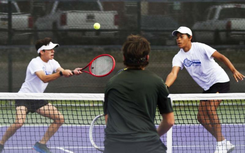 Sam Zmolik, left, and Mario Aguirre compete in the boys’ doubles district championship against Gatesville on Tuesday at Tarleton State University. JEFF LOWE | DISPATCH RECORD