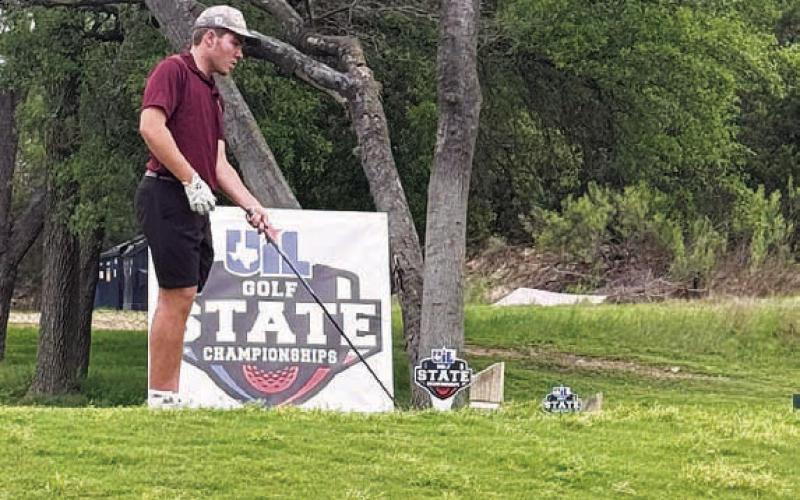 COURTESY PHOTO David Carr prepares to hit a tee shot at the state tournament.