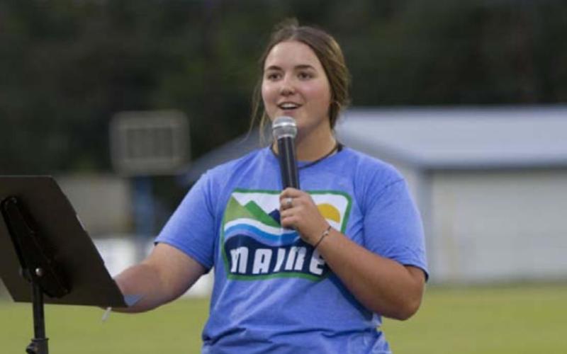 Saydie Smith speaks to the crowd at Fields of Faith. HUNTER KING | DISPATCH RECORD