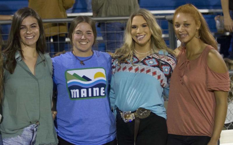 Rebecca Pearce, Saydie Smith, Lily Strickland and Juliana Dwamena pose for a photo after Fields of Faith. HUNTER KING | DISPATCH RECORD