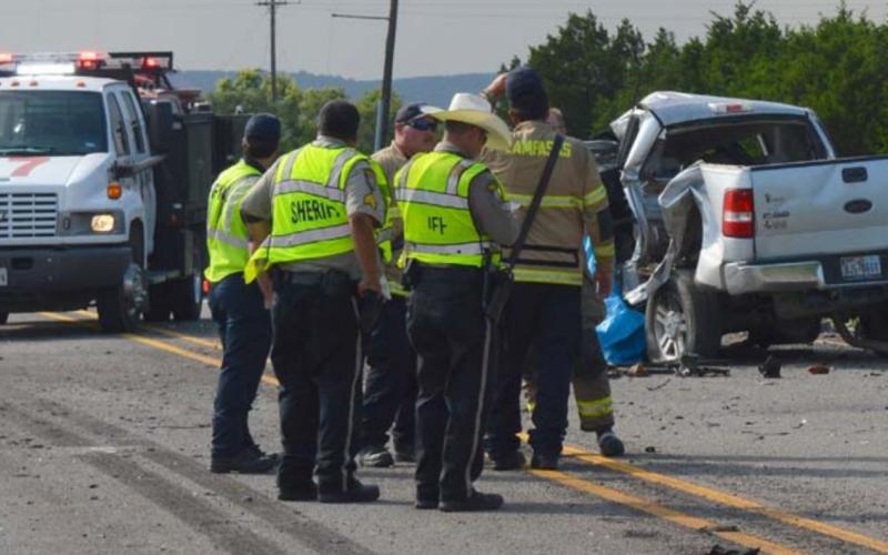 Emergency workers respond to a two-vehicle collision Wednesday afternoon outside Lometa. DAVID LOWE | DISPATCH RECORD