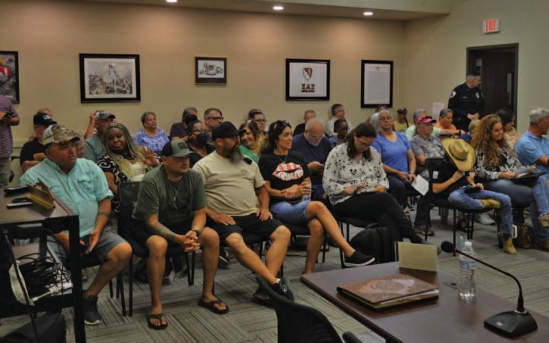 Kempner Water Supply Corp. customers fill the Kempner City Council Chambers during Tuesday’s public meeting on the water supplier’s troubles. Some attendees sat in the hallway outside the Council Chambers or listened via radio outside City Hall once capacity was reached in the meeting room. ERICK MITCHELL | DISPATCH RECORD