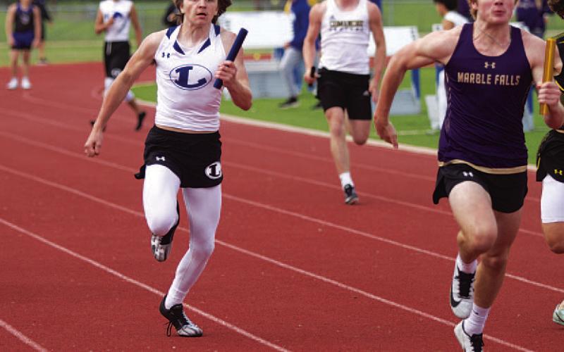 HUNTER KING | DISPATCH RECORD Jaden Phillips races down the final stretch of the boys’ 4x100-meter relay at last Wednesday’s meet.