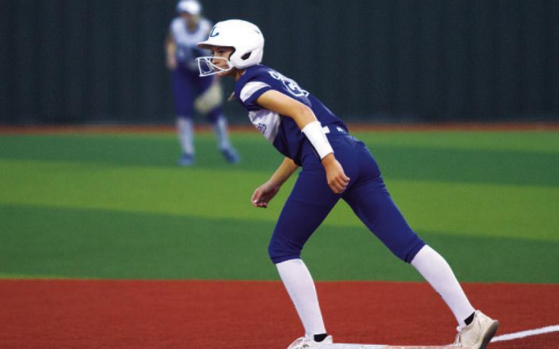 HUNTER KING | DISPATCH RECORD Sagen Plouff prepares to run off first base.