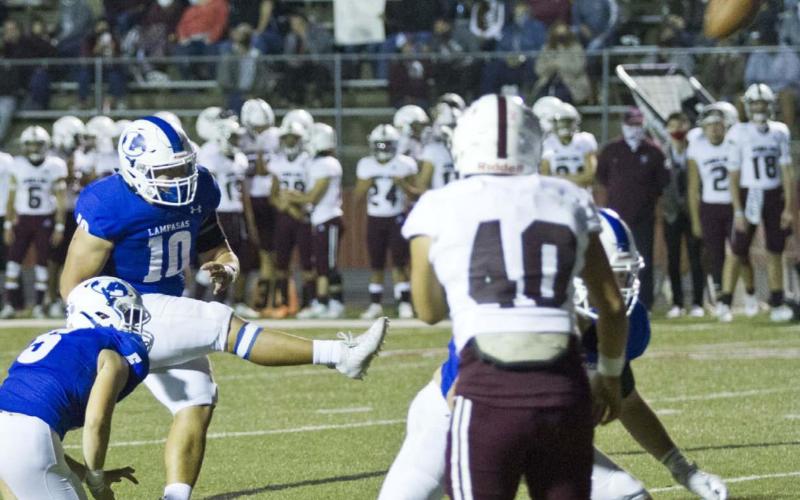 Joseph Whitehead (10) makes his first field goal of the season while Dax Brookreson (5) holds and Ian McKinney blocks a Uvalde Coyote. JEFF LOWE | DISPATCH RECORD