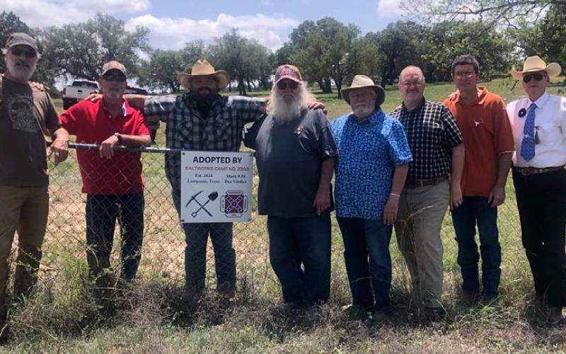 Sons of Confederate Veterans Saltworks Camp # 2353 have taken on the responsibility of maintaining Nix Cemetery in western Lampasas County. Pictured at the cemetery are, from left to right, William “Bill” Ables, Stephen C. Brister, Larry Chipman, William “Bill” Dunson III, David Spradley, Michael R. Oliver, Roger D. Hamrick and Ross J. Cox Sr. courtesy photo