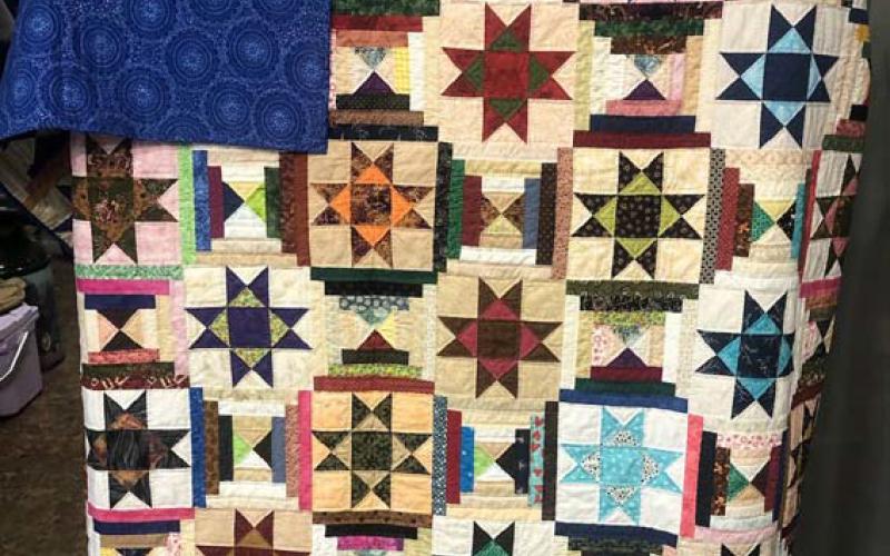 This quilt will be raffled during the week of the Spring Ho Festival. Tickets may be purchased from any member of The ’36 Club at the downtown farmers’ market each Saturday until July. Courtesy photo