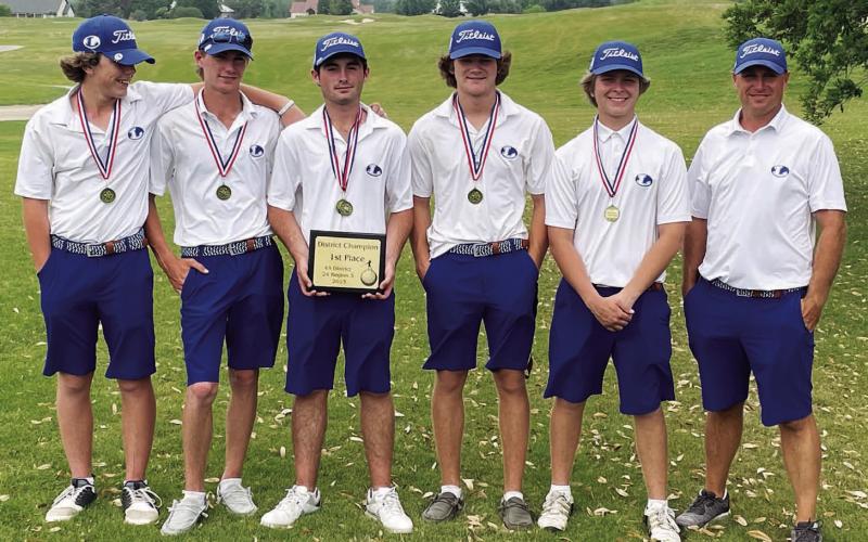 COURTESY PHOTO | GARRY SPORE James Clarkston, left, Coulson Plouff, Peyton Spore, Timber Gholson, Nick Haas and head coach Justin Schulze pose with their district championship plaque.